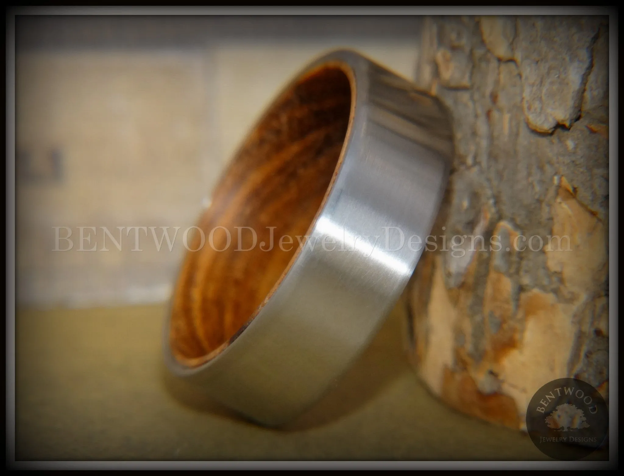Bentwood Zebrawood Core Ring and Surgical Grade Hypo-Allergenic Stainless Steel Exterior