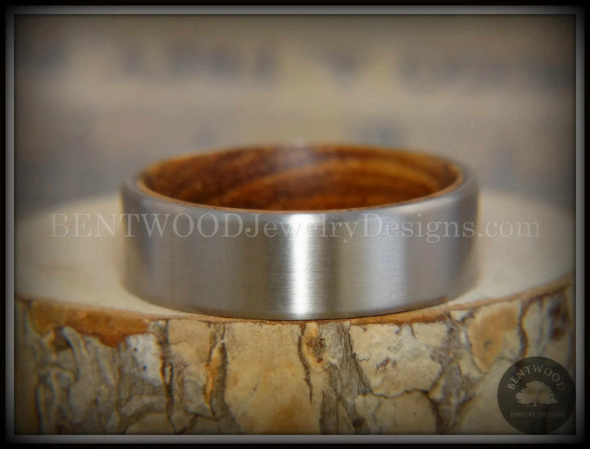 Bentwood Zebrawood Core Ring and Surgical Grade Hypo-Allergenic Stainless Steel Exterior