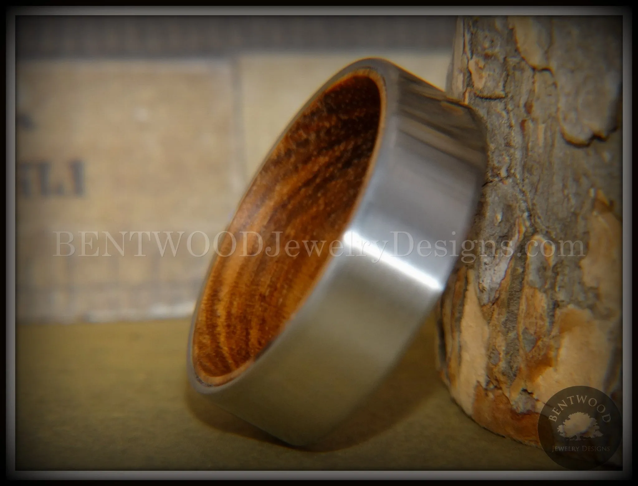 Bentwood Zebrawood Core Ring and Surgical Grade Hypo-Allergenic Stainless Steel Exterior