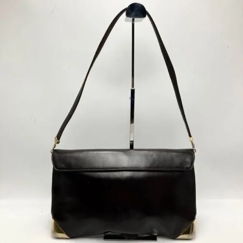 RARE, vintage, Dior, brown leather two-wy clutch/shoulder bag with a brown trotter print interior and accent that peeks through the front
